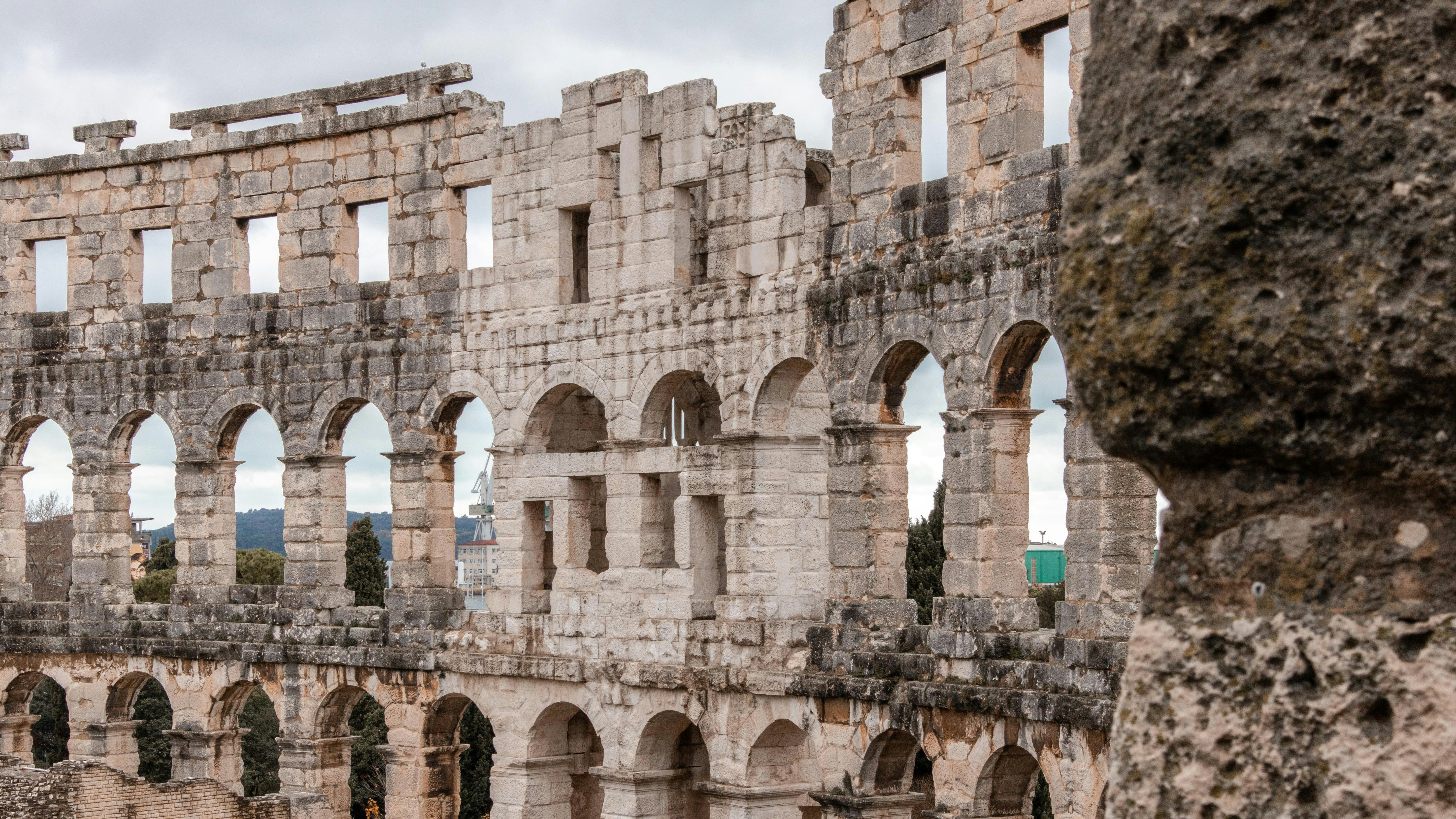 Bryzantine era archways of the ancient Roman Pula Arena in Croatia.