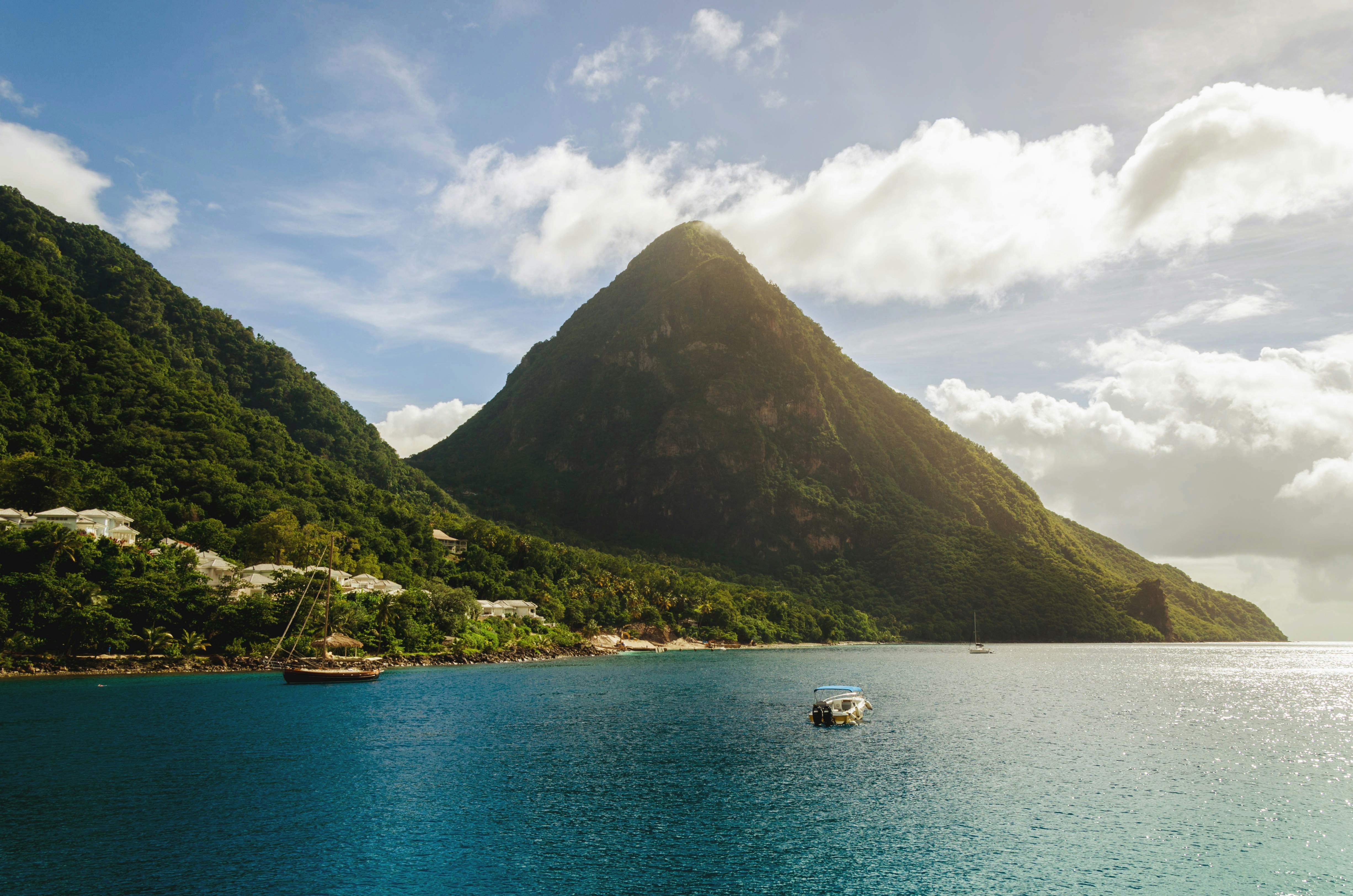 Photograph of lush caribbean mountain islands during golden hour
